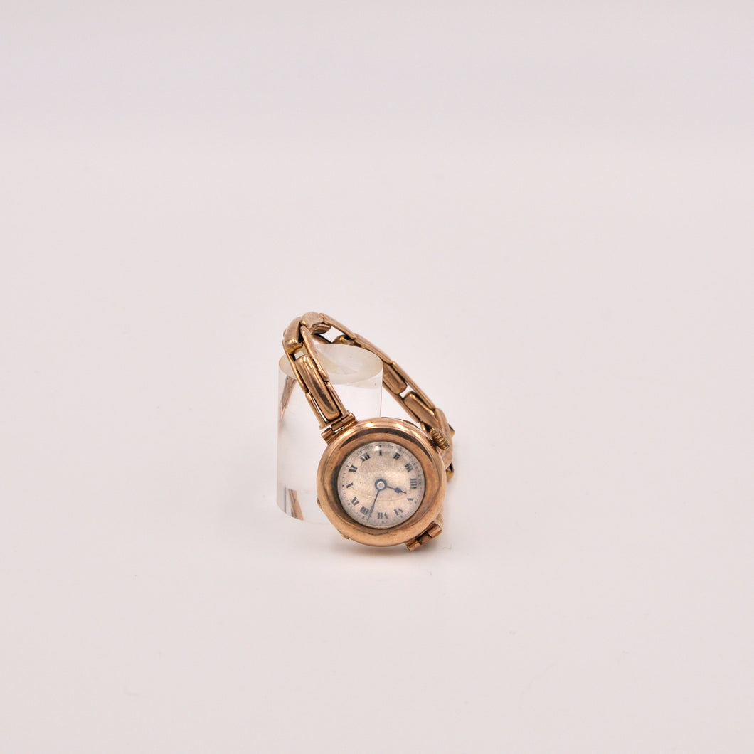 Orologio in oro con bracciale ad elastici, primi '900- First 900s  gold watch with elastic bracelet.